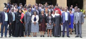 Chief Justice Hon. Lady Martha Koome (5th from right) and CRA Chairperson Dr. Jane Kiringai (6th from right) with the new members of the Commission on Revenue Allocation, family members and friends at the Supreme Court on January 9, 2023