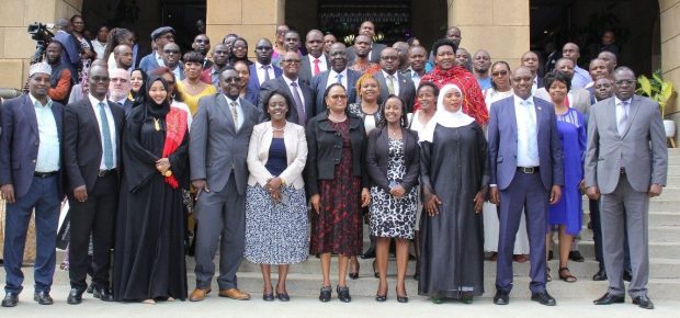 Chief Justice Hon. Lady Martha Koome (5th from right) and CRA Chairperson Dr. Jane Kiringai (6th from right) with the new members of the Commission on Revenue Allocation, family members and friends at the Supreme Court on January 9, 2023